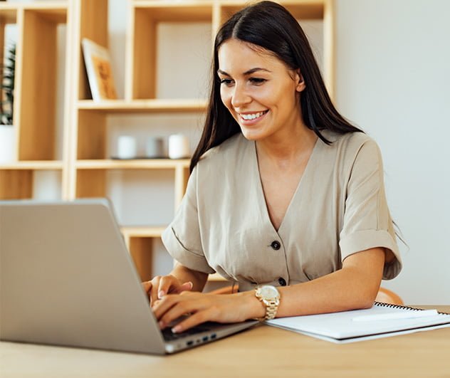 smiling girl with a laptop